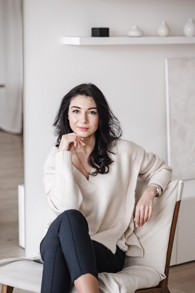 Female entrepreneur sitting in contemporary workplace